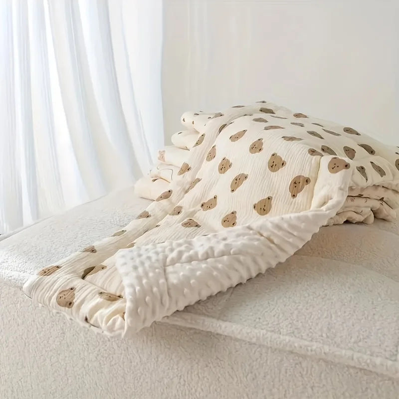 La photo montre un coussins universels à poser sur une poussette pour bébé.